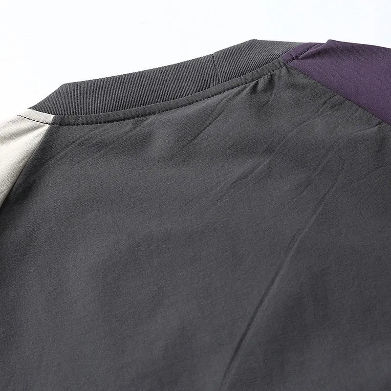 Dark grey men's t-shirt with contrast colour raglan sleeves and loose fit casual styling