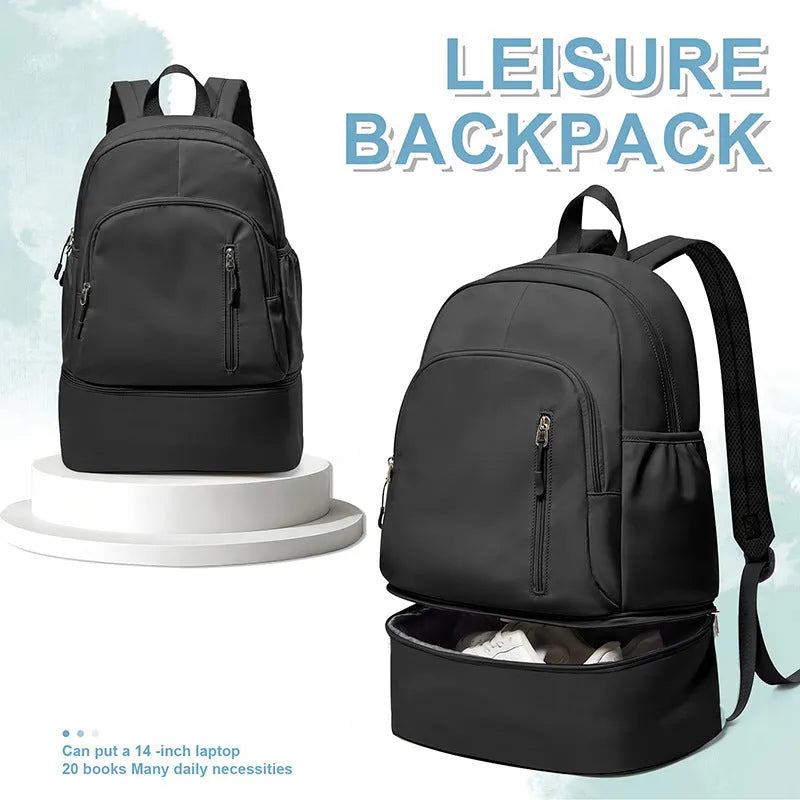Waterproof polyester travel backpack in black colour showing curved shoulder straps and contrast stitching details