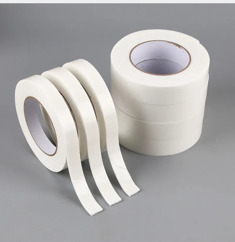 Roll of 3mm thick white foam double-sided adhesive tape with clear BOPP liner, showing width options.