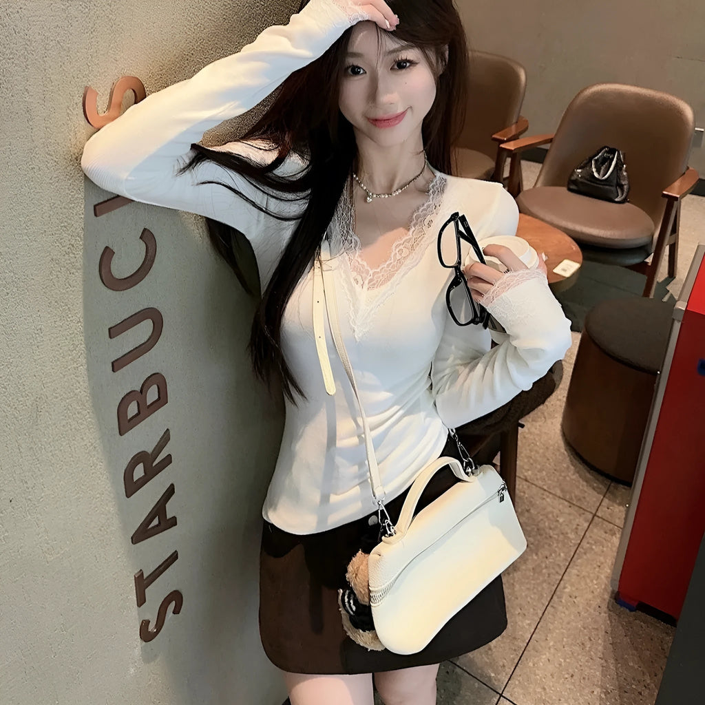 White V-neck long sleeve top with lace stitching in brushed polyester knit fabric, slim fit