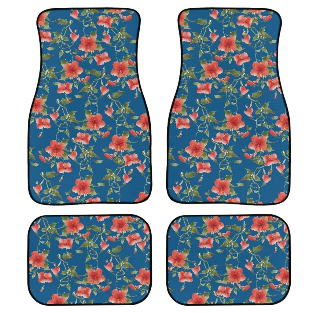 Black universal fit rubber car floor mats set of four with textured surface, shown in a vehicle footwell.