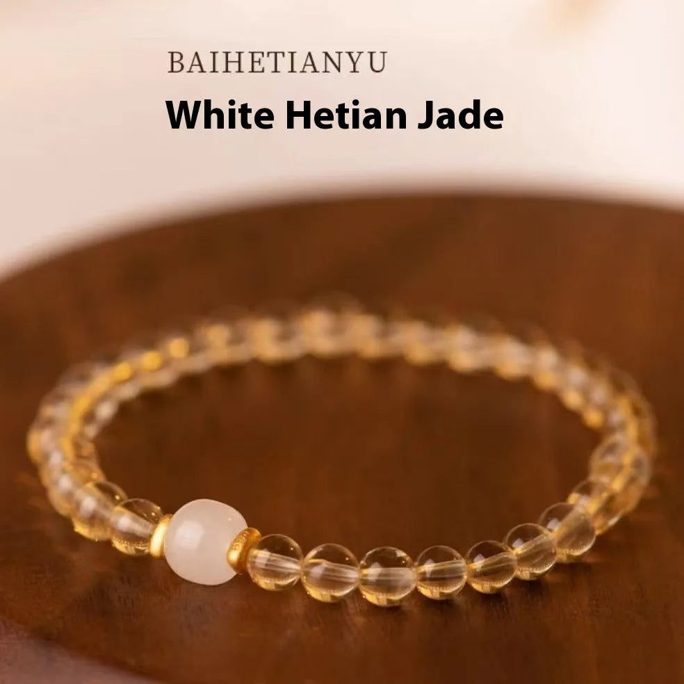 Brazilian rutilated quartz bracelet with gold rutile needle inclusions in 6mm or 8mm bead sizes