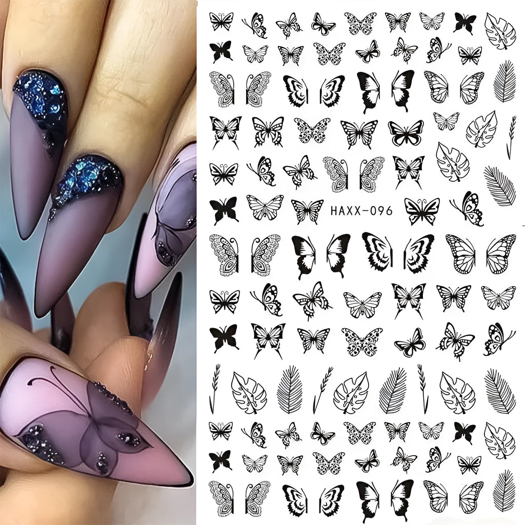 Black butterfly nail stickers with white flower and gold accents on a manicured hand, adhesive decal set