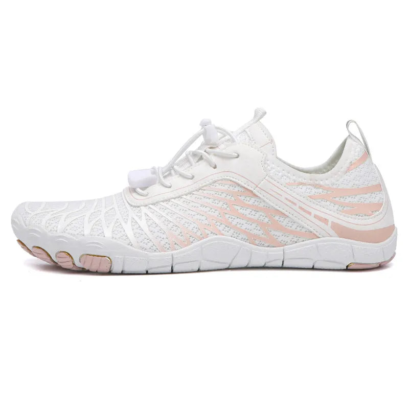 Low-top white outdoor sports shoes with lace-up front and textured rubber sole.