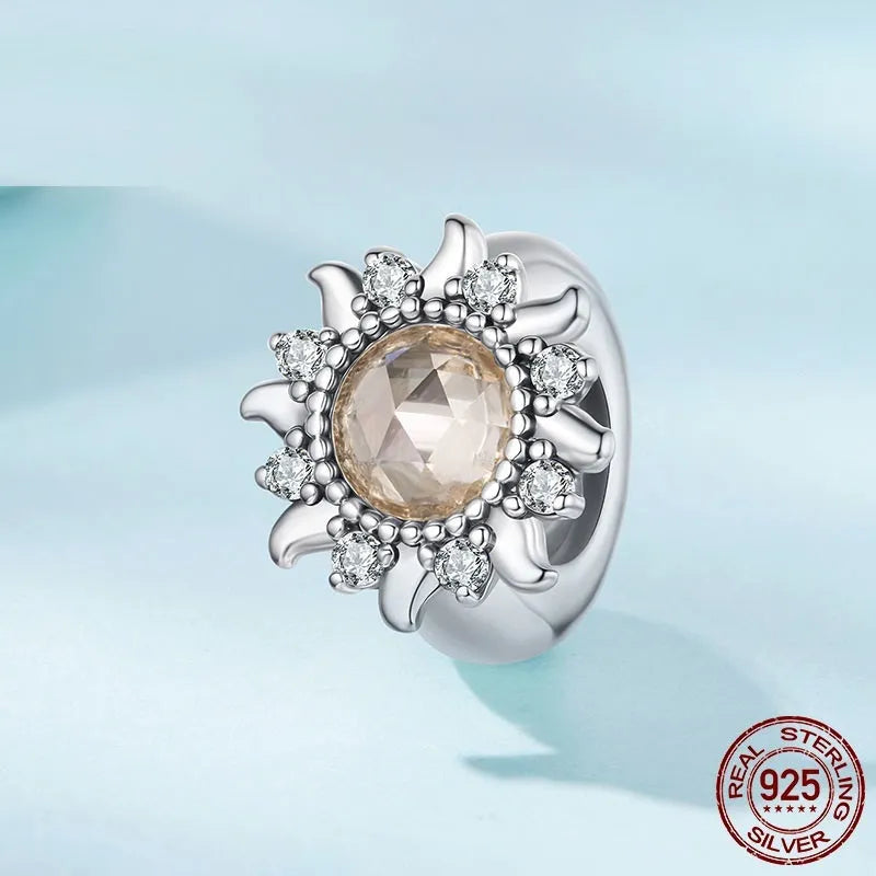 S925 sterling silver sunflower spacer bead with silicone positioning, 0.9cm height and width, 0.45cm aperture, on white background