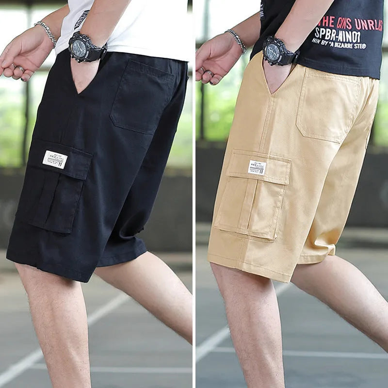 Man wearing loose fit khaki Korean style cargo trousers with a slim silhouette.