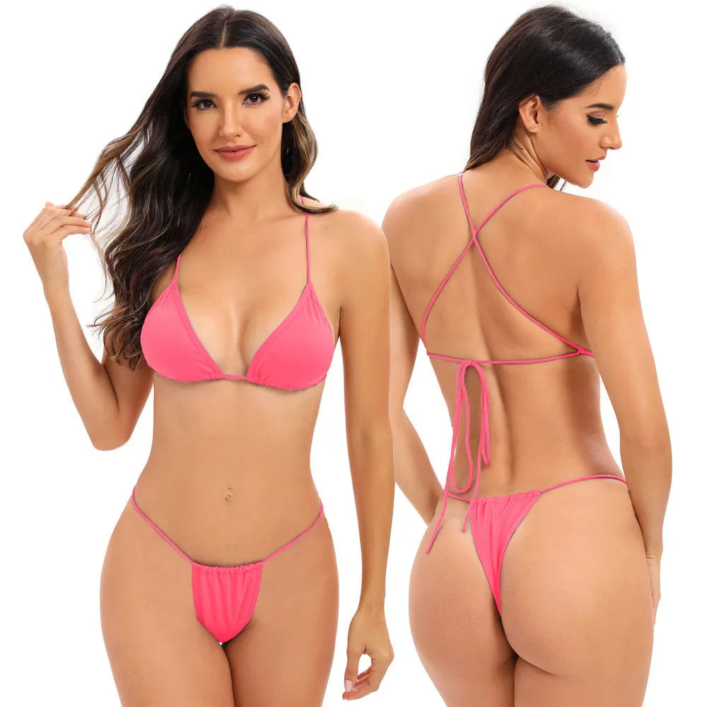 Women's candy coloured cross strap bikini swimsuit on a hanger, showing striped pattern and optional chest pad.