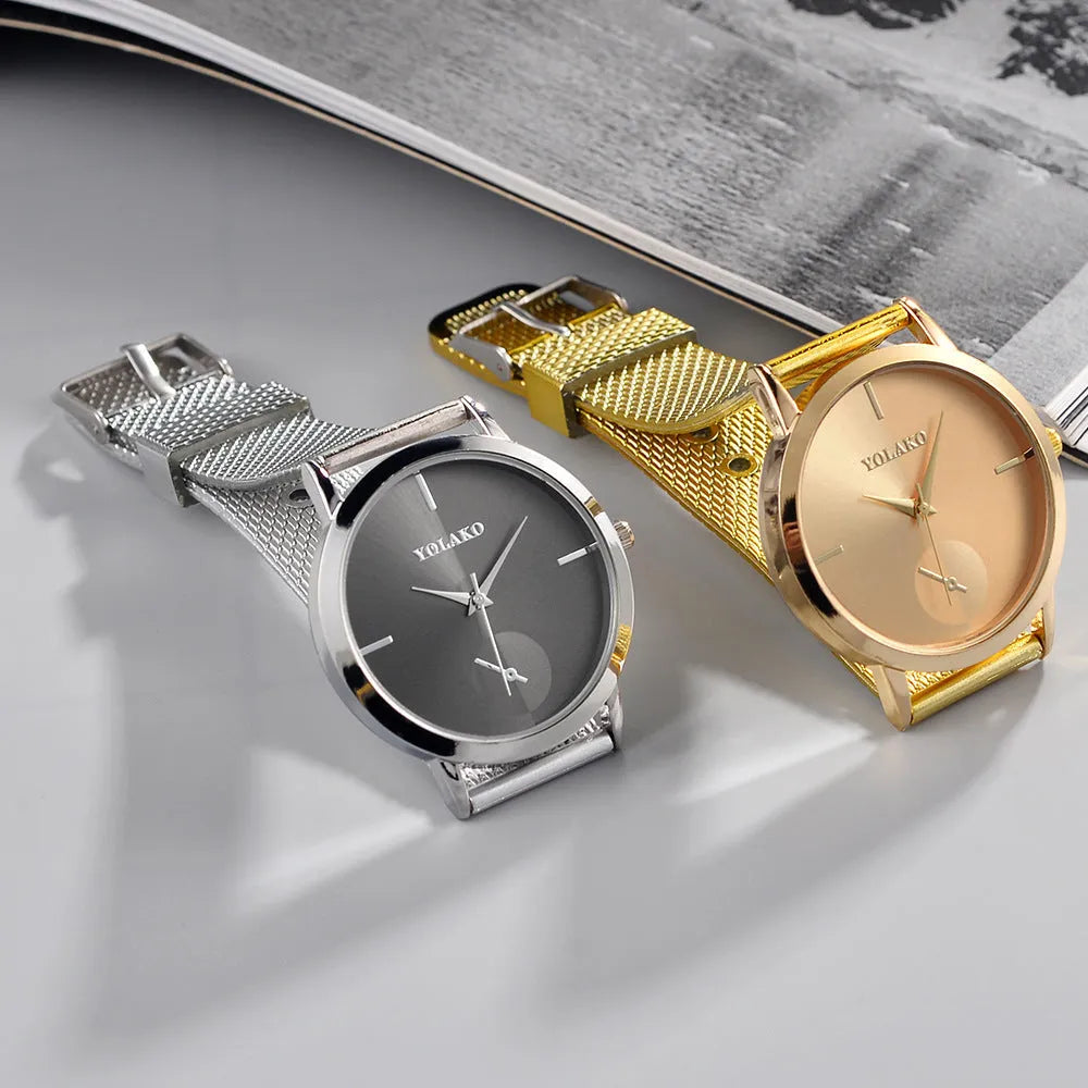 Simple ladies quartz watch with stainless steel strap, 40mm black dial, and mineral glass mirror on neutral background