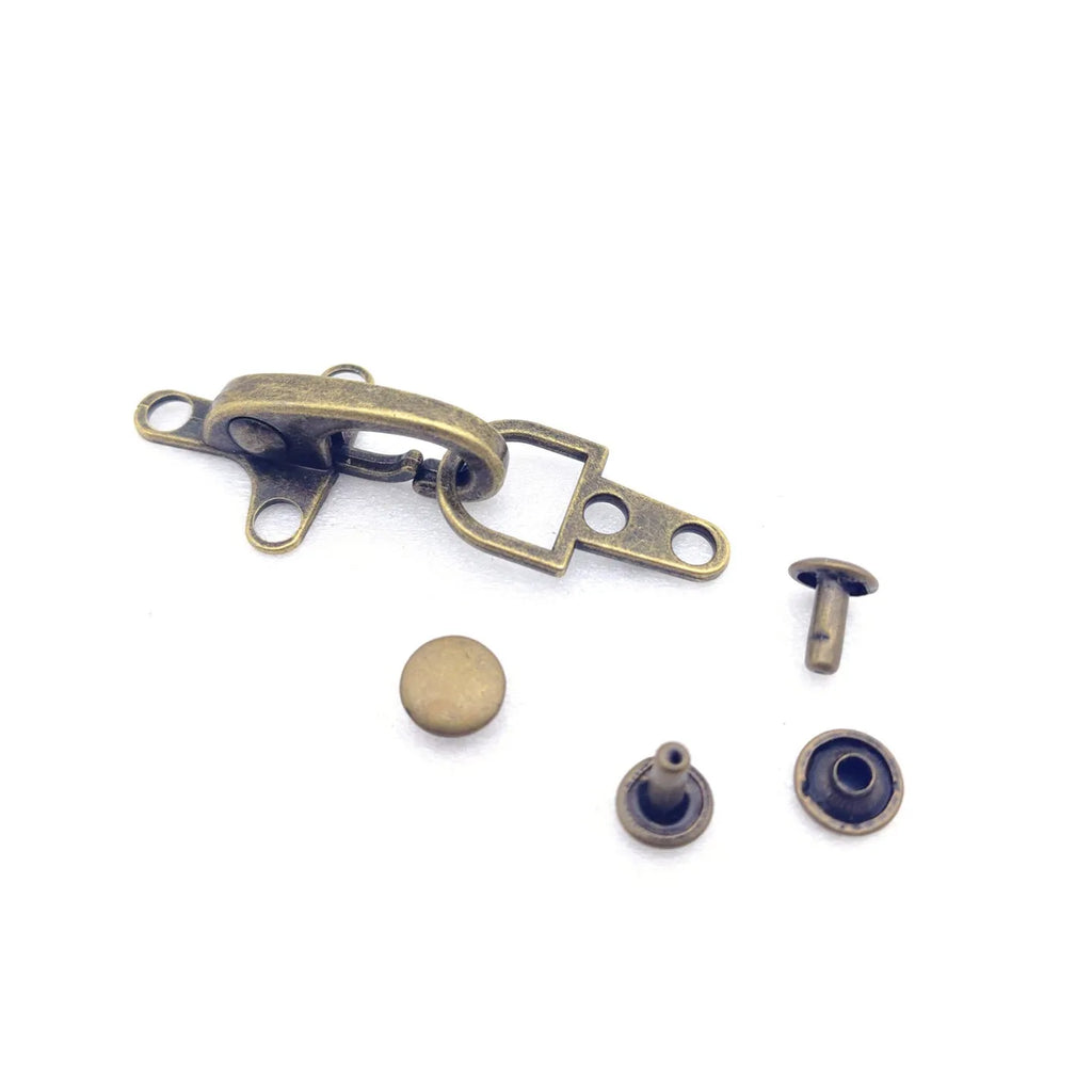Zinc alloy metal aircraft-shaped hanging buckle decoration in bronze, gold, gun colour, or silver finish.