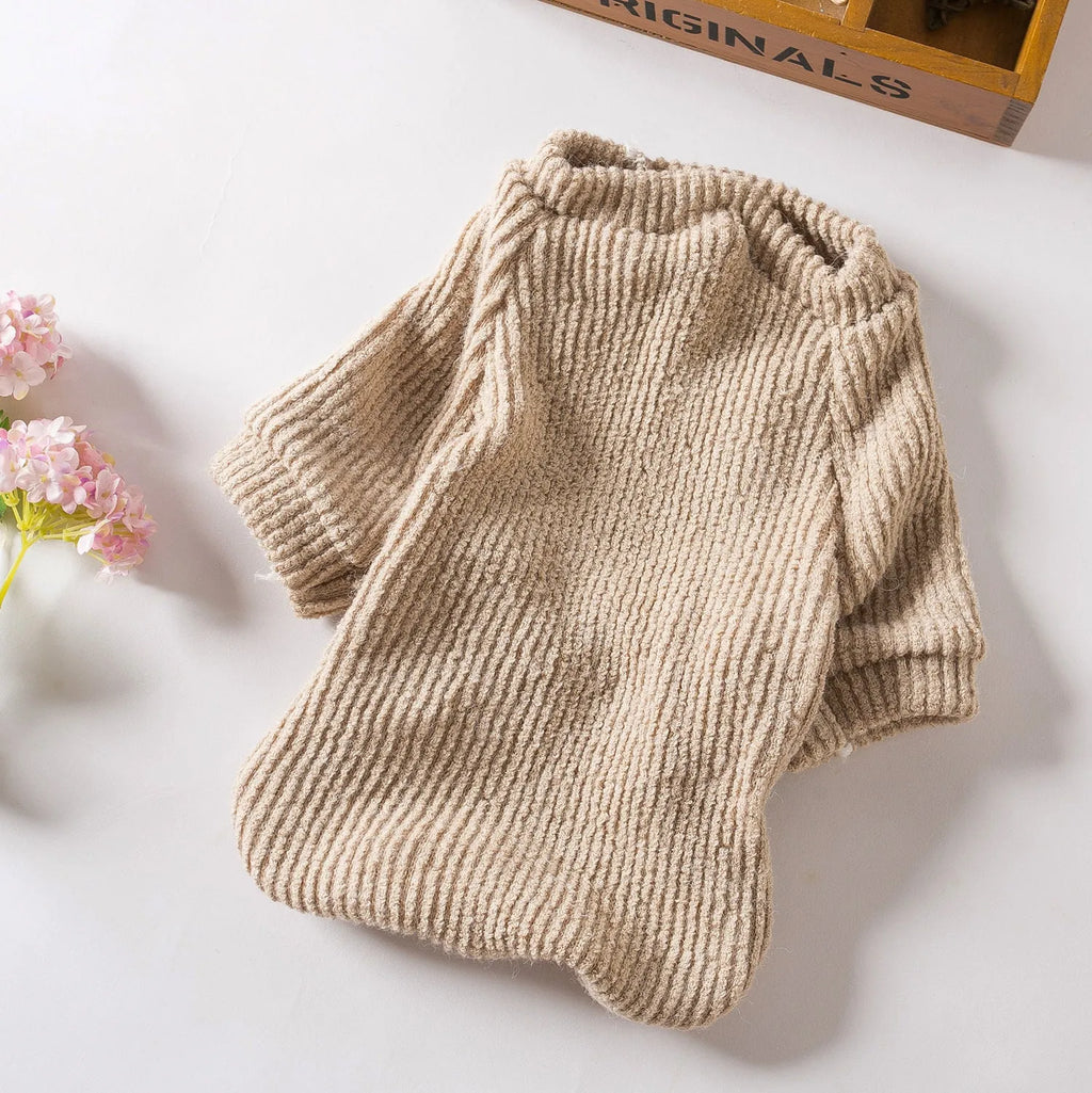Brown knitted cloth sweater pullover on a small dog, showing casual style.