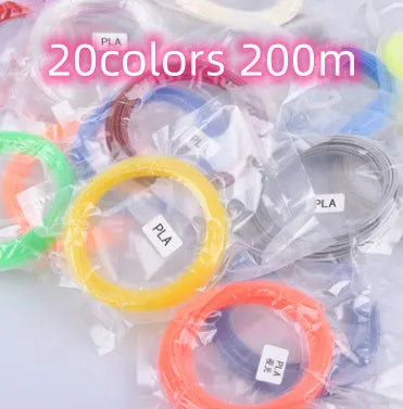 Yellow 3D printing pen with 12 colour PLA filament spools and UK power adapter on a white background