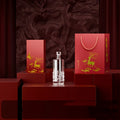 Two empty crystal glass wine bottles with two wine boxes and one handbag, traditional cylindrical shape for liquor