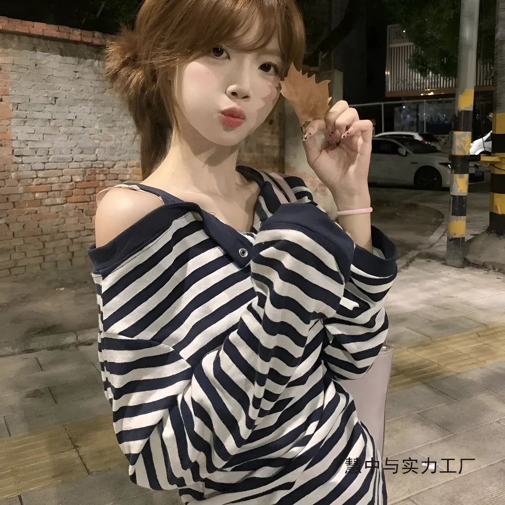 Dark blue Korean-style oversized women's long-sleeved T-shirt with embroidery and stripe details.