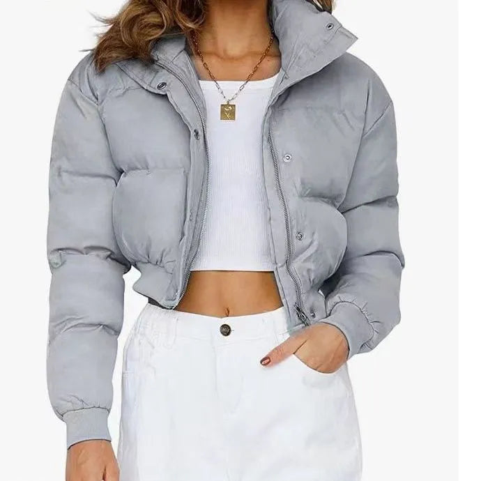 A woman's loose-fitting long sleeve polyester jacket in a choice of colours.