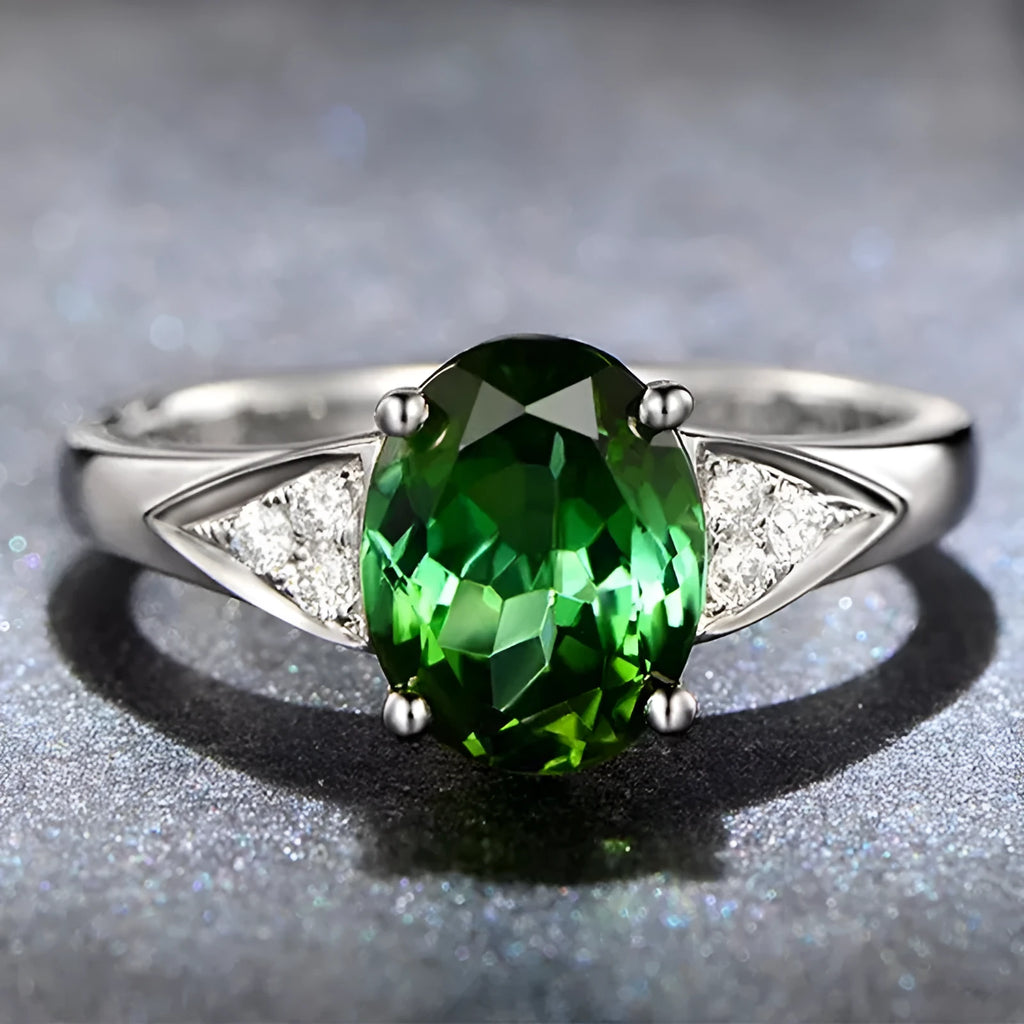 Women's court style zircon ring with natural stone inlay and heart pattern accent in blue.