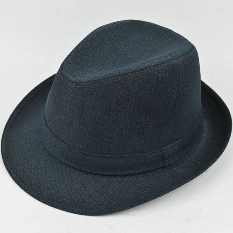A classic brown fedora hat for men on a wooden stand, showing its structured crown and medium-width brim.