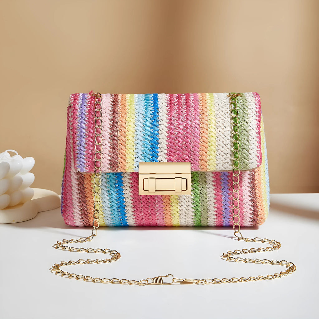 Women's straw cross-body bag with lock detail in rainbow colour showing square shape