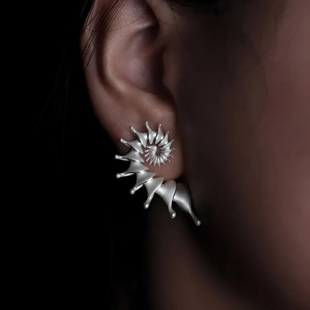 Conch-shaped three-dimensional matte earrings with exaggerated drop design and irregular shaping