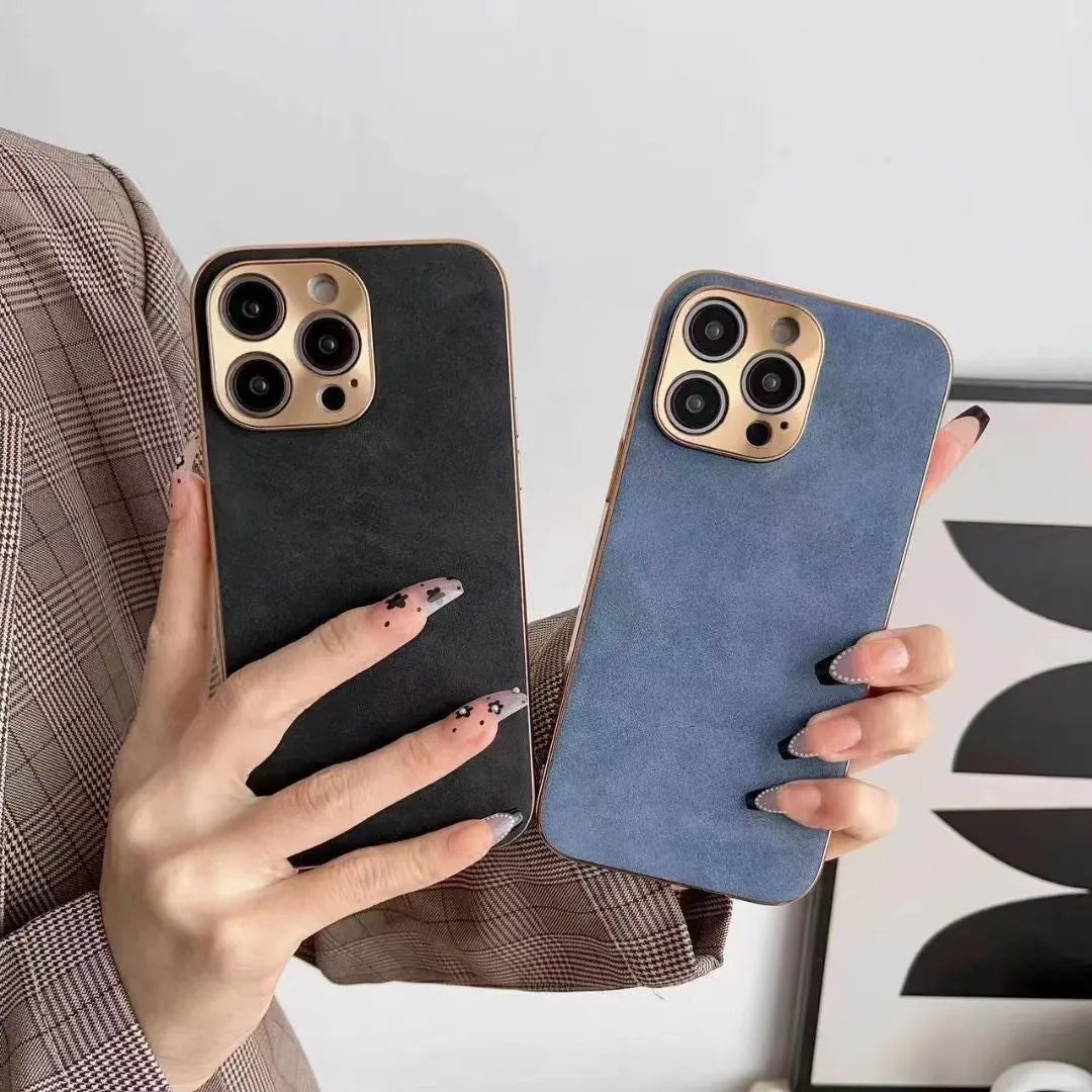 Leather-textured TPU phone case for iPhone on a table, showing colour and precise button cutouts.