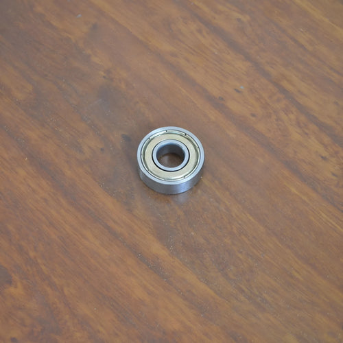 6000z carbon steel ball bearing with 10mm inner diameter, 26mm outer diameter, and 8mm width on a white background.