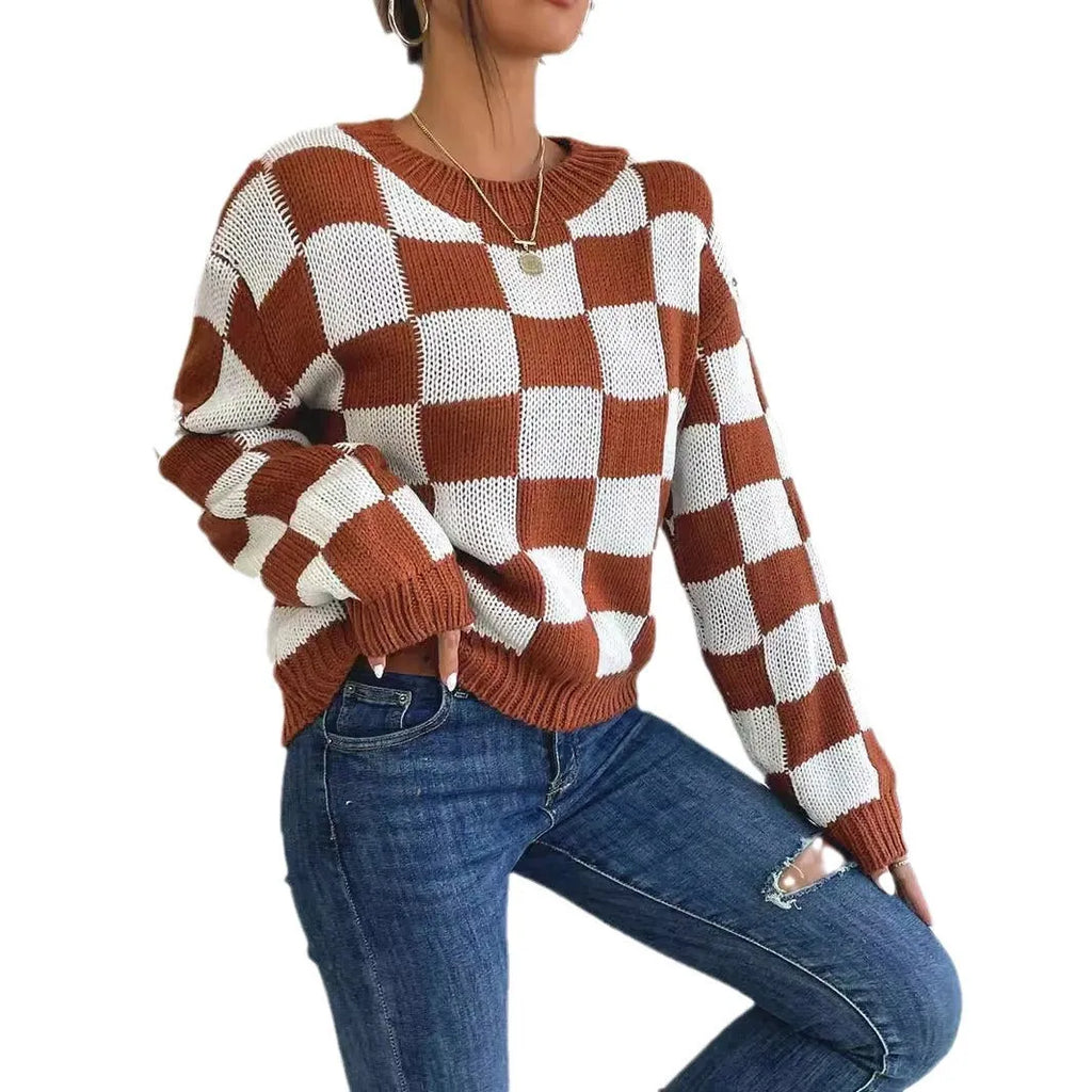 Dark brown loose-fit pullover sweater with a plaid chessboard pattern and long sleeves.