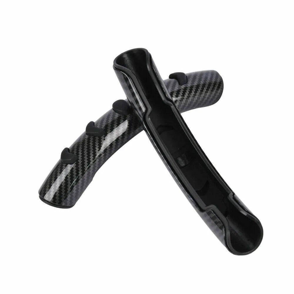 Carbon fibre black anti-skid steering wheel sleeve fitted on a car steering wheel.