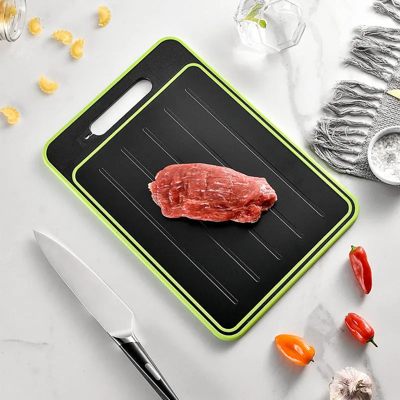 Grey square aluminium cutting board with double-sided design showing thawing surface and integrated knife sharpener