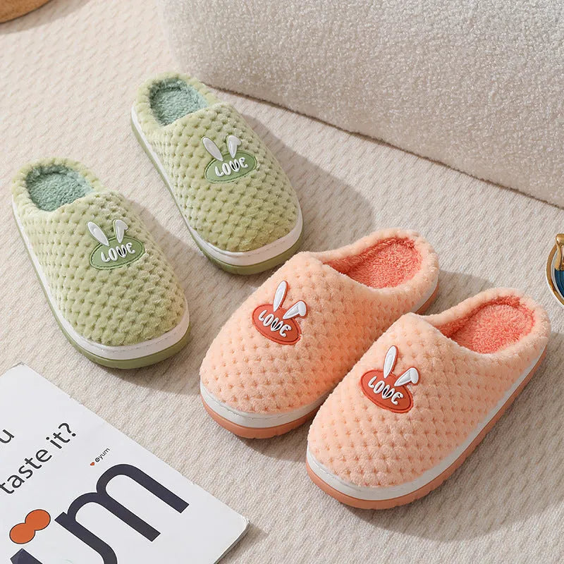 Women's rabbit plaid patterned artificial fur slippers with a thick sole and non-slip rubber base.