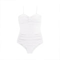 A woman modelling a solid colour one-piece swimsuit with adjustable suspender-style shoulder straps.