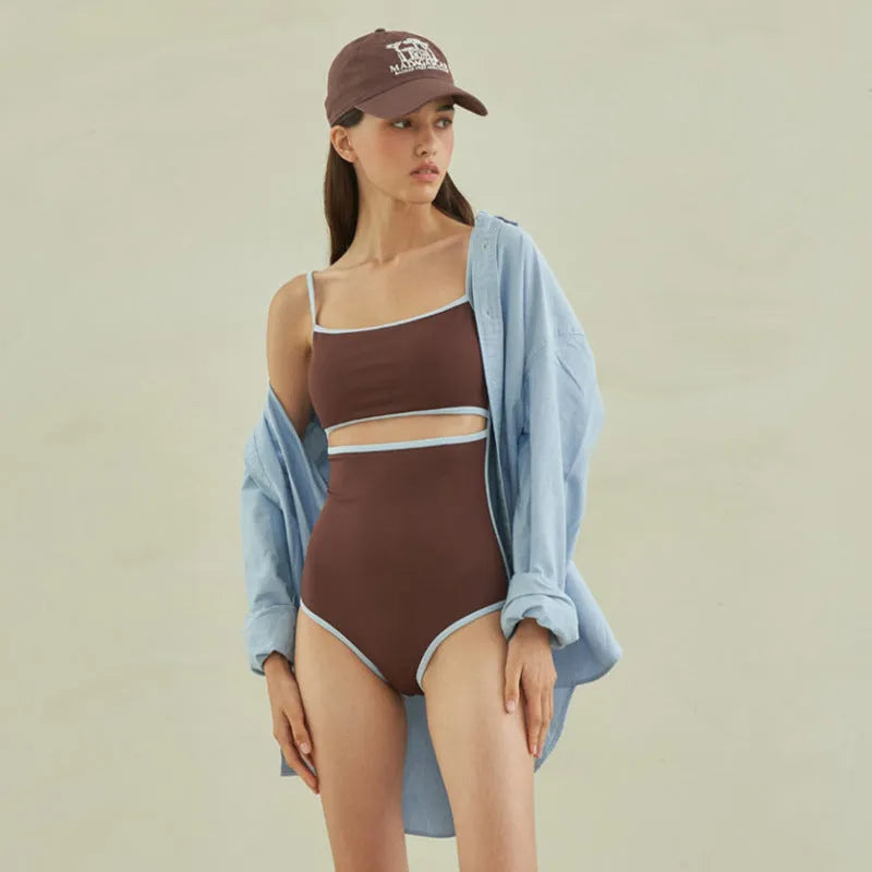 Brown triangle style one-piece swimsuit for women with sexy pattern
