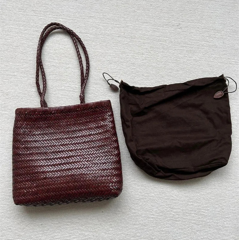 Brown handmade woven tote bag made of genuine cowhide leather with a three-dimensional pocket.