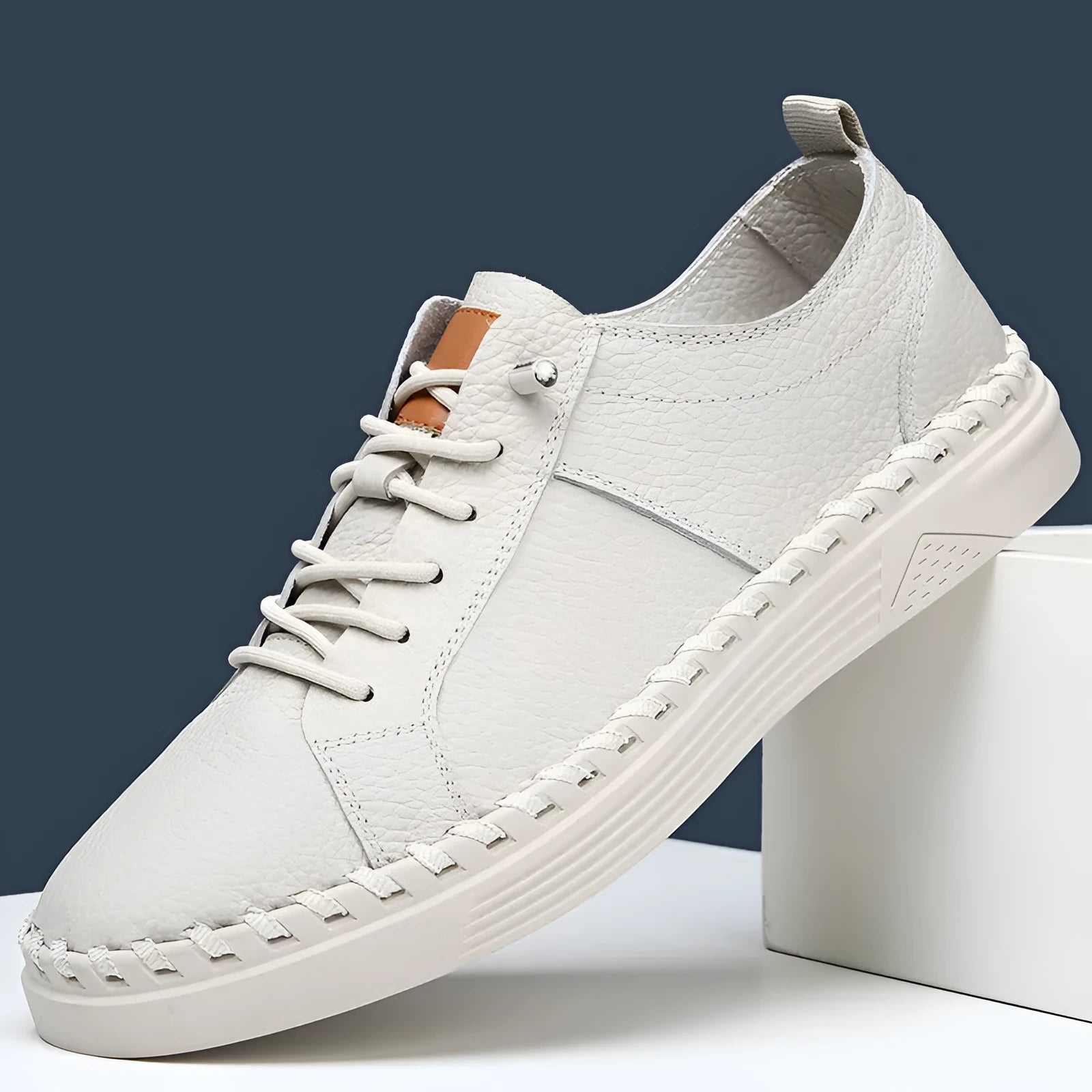 Men's beige cowhide sneakers with mesh lining and stitching details