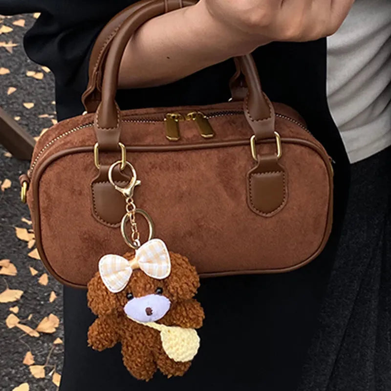 PU bowling bag in black, brown, coffee or green with optional pendant, horizontal square shape and single strap.