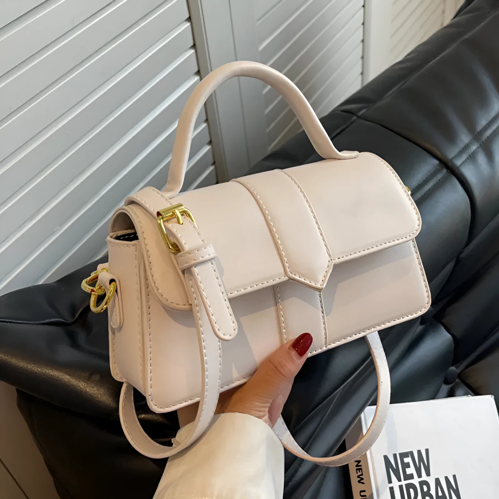 Women's horizontal square messenger bag in PU material with internal file organisation