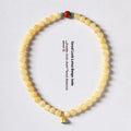 Yellow jade handmade bracelet with lotus seedpod design and double ring structure