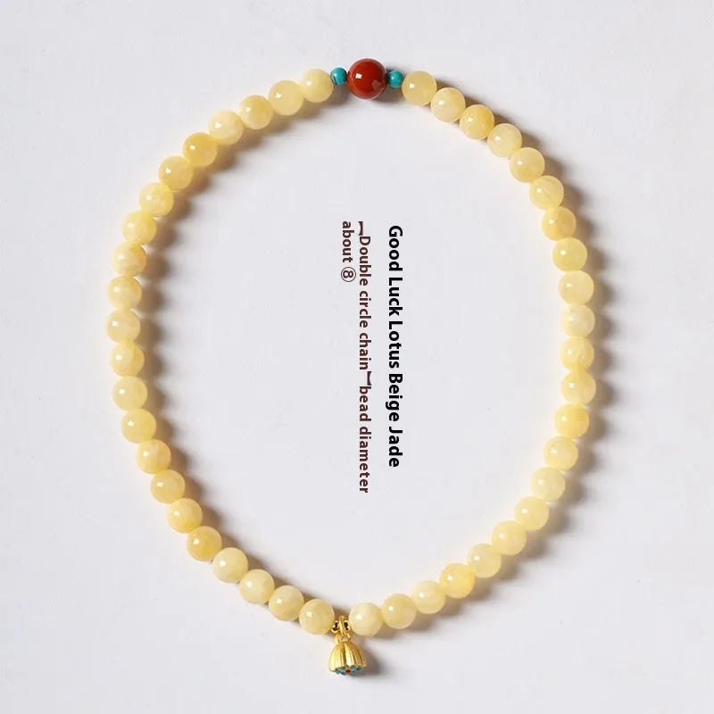 Yellow jade handmade bracelet with lotus seedpod design and double ring structure