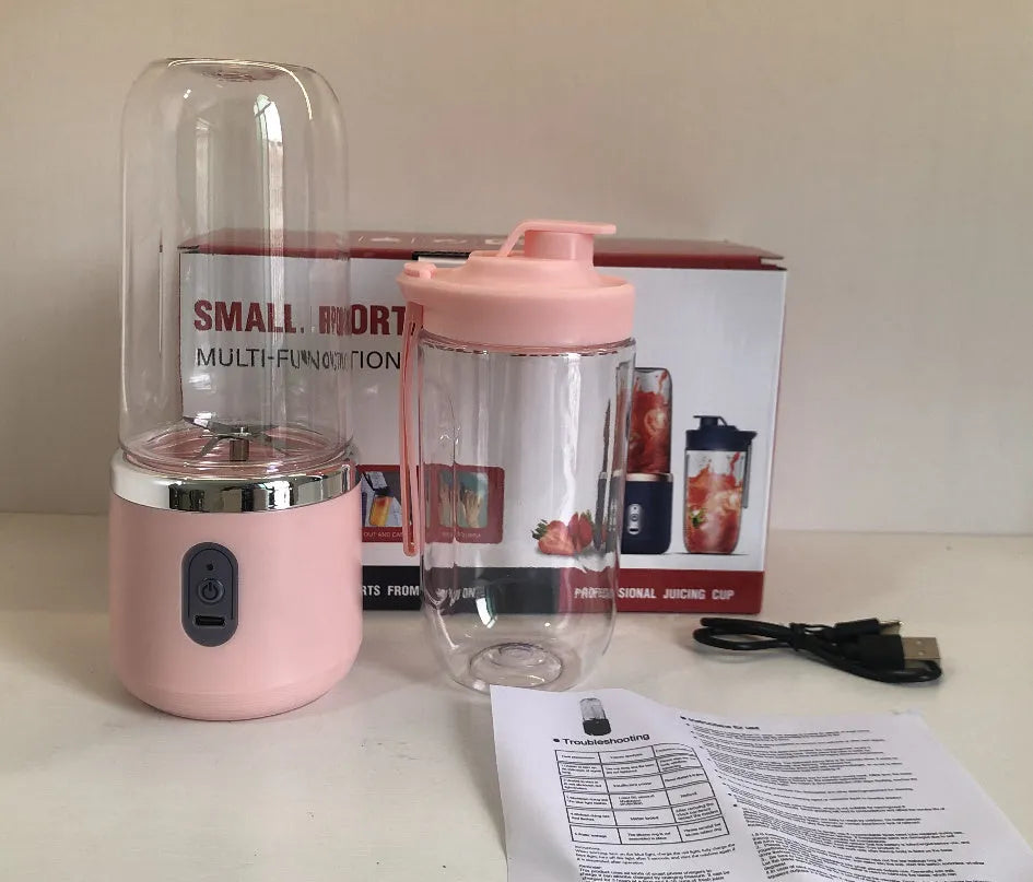 Tunisian dark blue portable USB blender with cup lid, showing compact size and 6-blade design