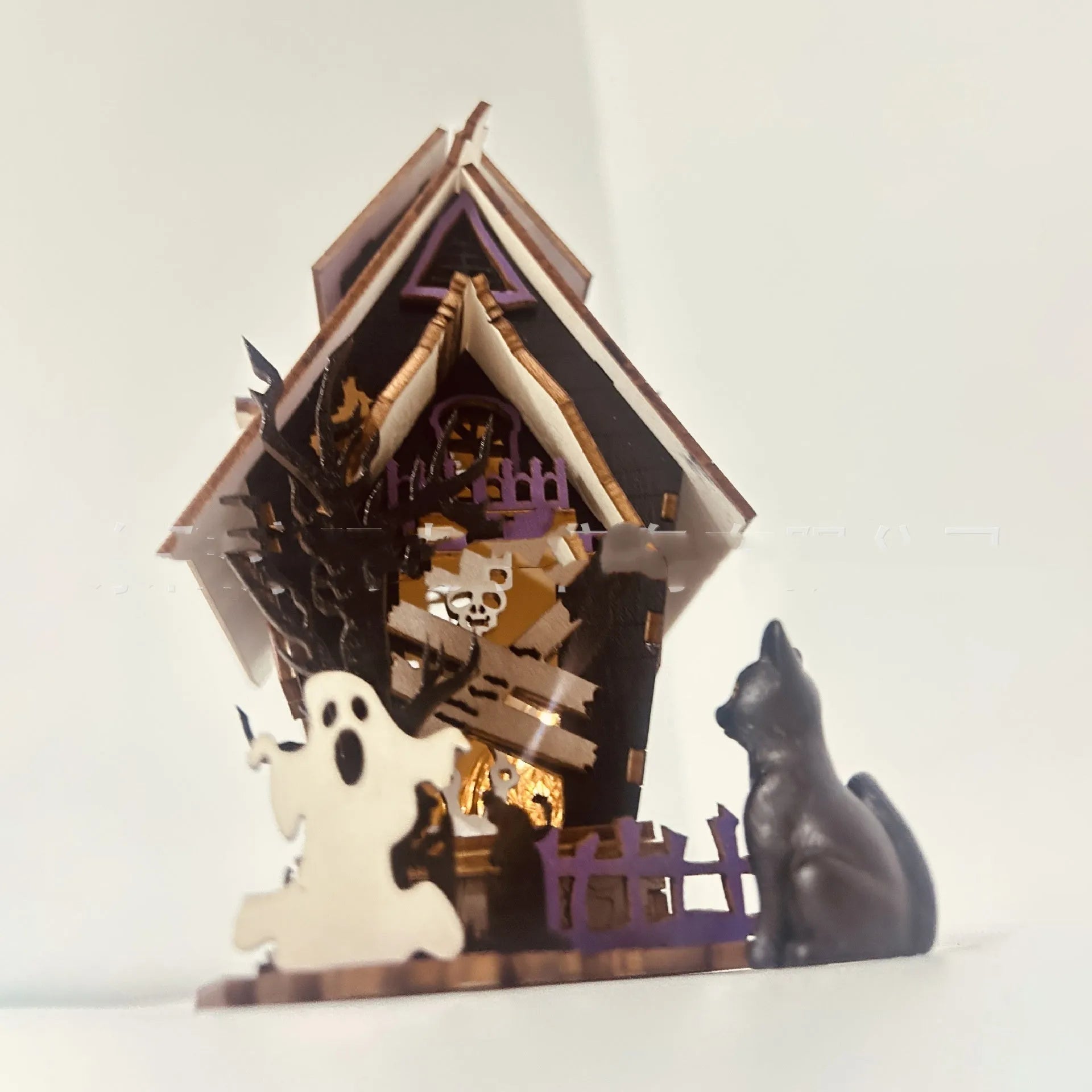 Wooden DIY haunted house Halloween table decoration measuring 14cm wide by 19cm tall