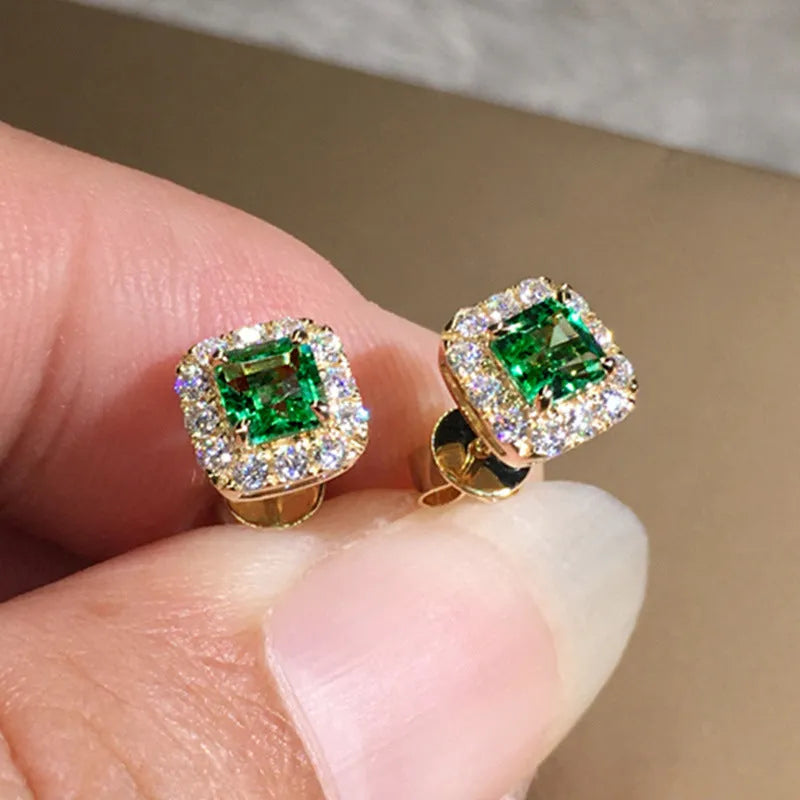 Square-cut bright green zircon stud earrings with a gold electroplated finish on a copper setting.