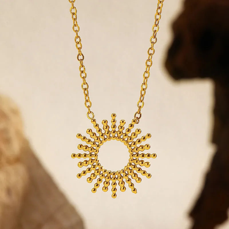 Sunflower Series women's 14K gold-plated geometric chain necklace and bracelet set.