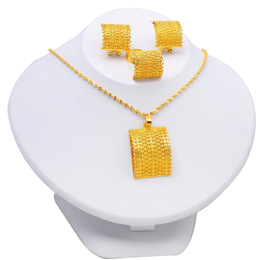 Golden bridal jewellery set with copper necklace, earrings, and ring for wedding occasions