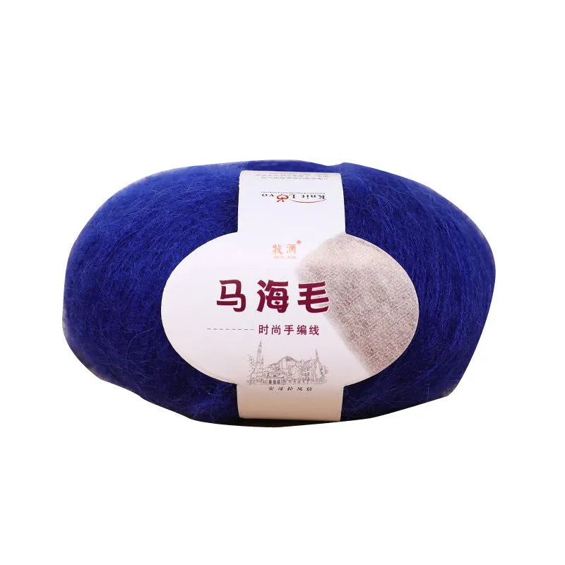 Hand-woven DIY mohair scarf kit with wool ball, shown in a selection of colours including beige, pink, and blue.