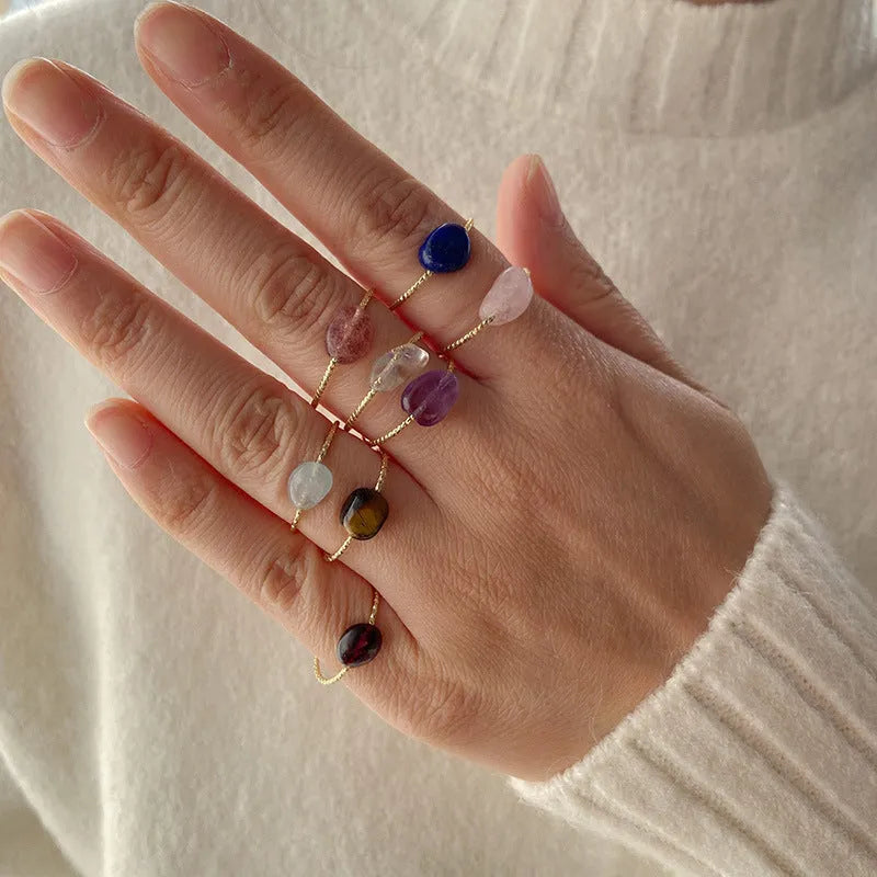 A geometric-shaped agate ring for women in an original design, showcasing natural stone colouration.