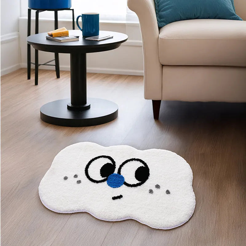 Big eye clouds cartoon print bathroom mat in green, showing soft, thickened polyester fibre pile.