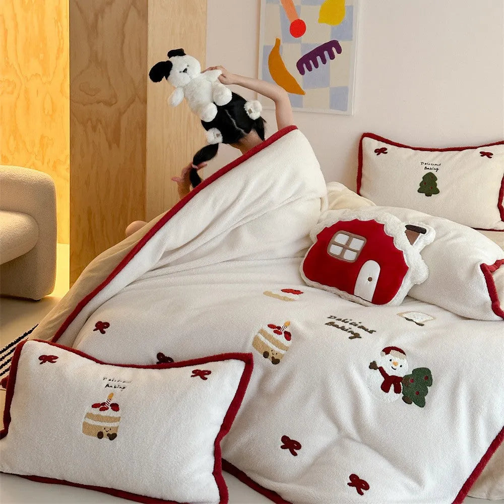 Winter Christmas cartoon bedding four-piece set with snowman milk pastry pattern on bed