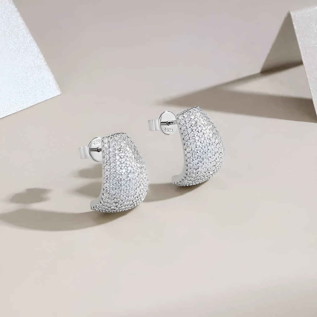 Women's geometric sterling silver ear studs with white moissanite stones