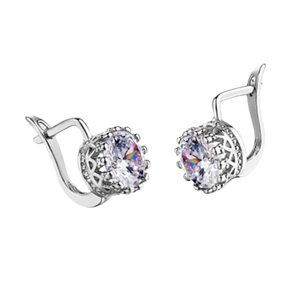 Korean retro crown design ear clip earrings in rose gold or white gold finish with white diamond accents.