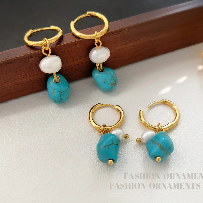 A pair of long and a pair of short geometric earrings with irregular turquoise and cultured pearls on copper ear clips.