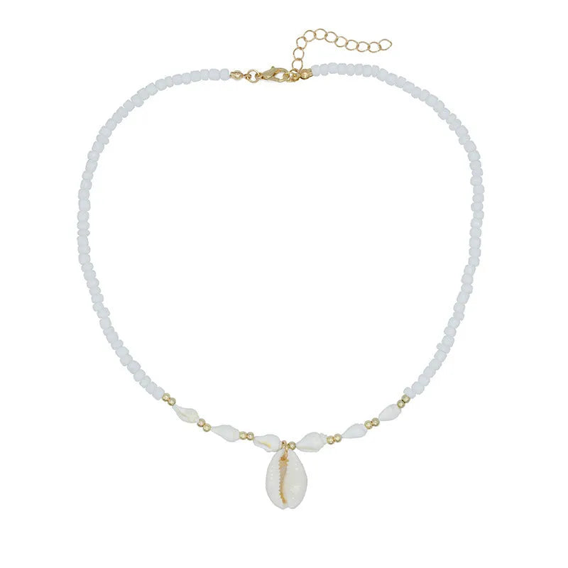 White necklace with a natural shell and mother of pearl pendant on a regular chain.
