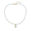 White necklace with a natural shell and mother of pearl pendant on a regular chain.